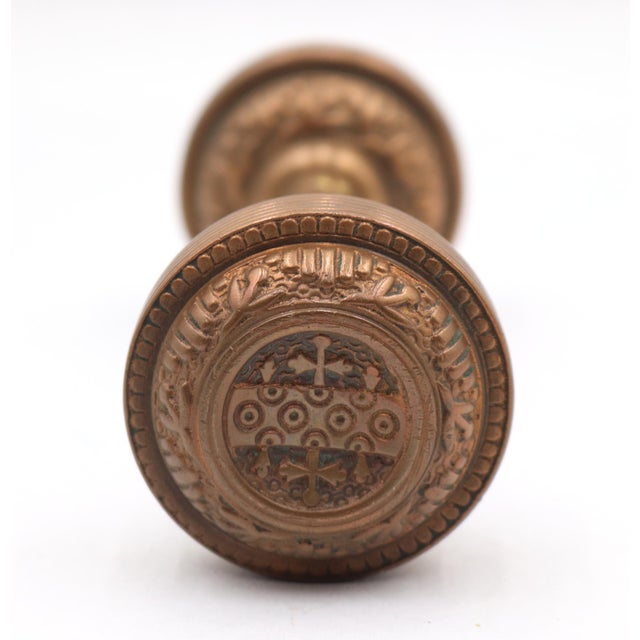 This Vernacular style two fold brass door knob was made by Reading in the 1887 catalog. It is part of the F-11300 Windsor...