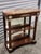 Antique Empire style early 20th century Mahagony console table with pink Italian marble top and mirrored back. The console...