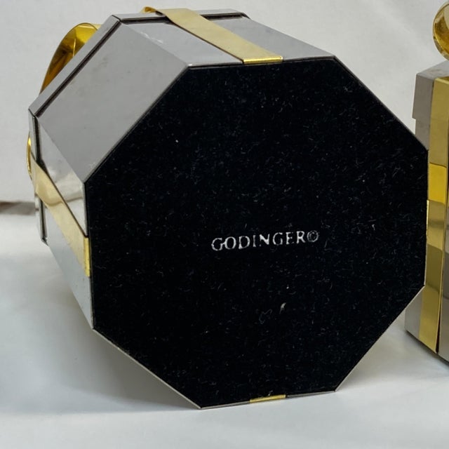 Godinger silverplate gift box shaped candle holders with brass ribbons. Set of 3 different sizes. Condition: Good vintage...