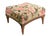 Large antique French Provincial or Louis XVI floral tapestry footstool with carved wooden legs and detailed under-trim....