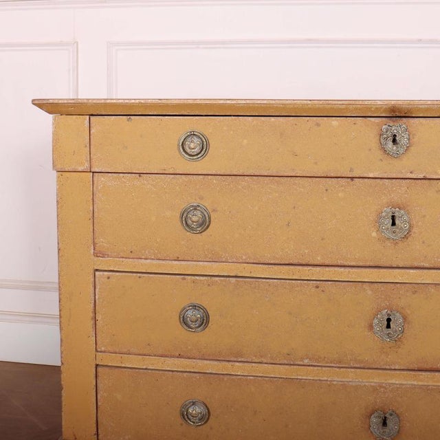 Good early 19th C French painted 4 drawer oak commode. 1820 This piece is designed in the style of the selected designer...
