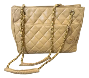 1980s Vintage Chanel Beige Lambskin Leather and Brass Shoulder Bag