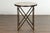 An Italian vintage bronze side table from the mid 20th century, with variegated marble top and paw feet. Created in Italy...