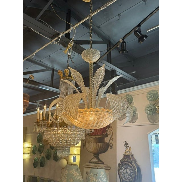 The Murano Glass Gold Leaf Chandelier is a luxurious and elegant lighting fixture for any home. Made with high-quality...