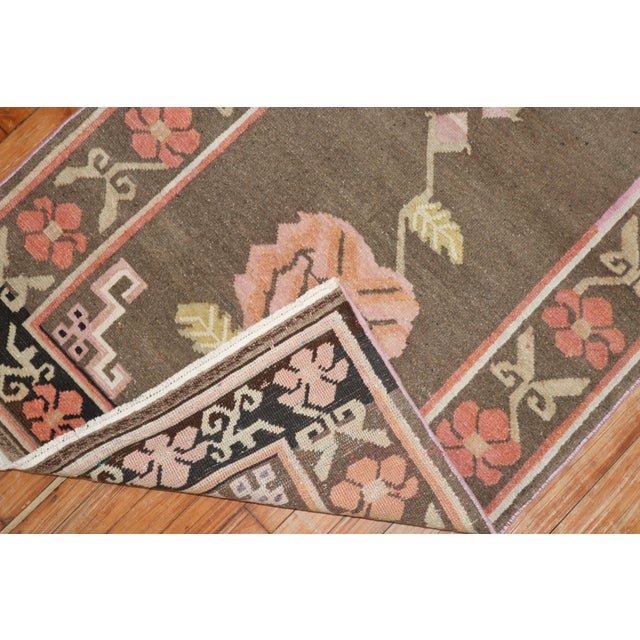 A floral one-of-a-kind Tibetan rug from the middle of the 20th century Measures: 3'1'' x 6'.
