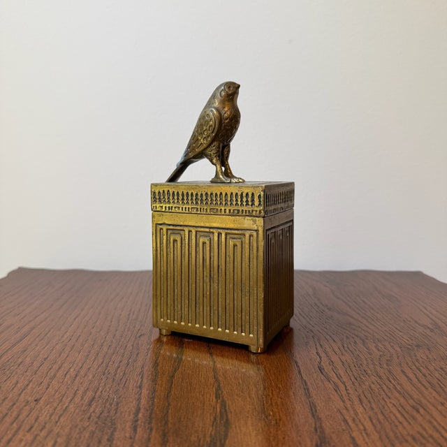 Very unique decorative brass box with a majestic falcon on the removable lid is a stunning vintage decor piece. This...