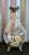 A striking vintage glass claret jug or pitcher featuring an ornate 95% tin pewter (Étain) mount in an elegant French-...