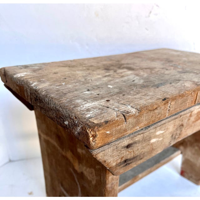 Imported from France. Handcrafted wood milking stool. Rustic design. Natural outdoor aged patina. Originally created in...
