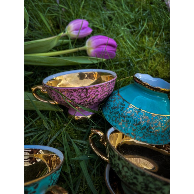 Charming set of five vintage German porcelain cups by Rudolf Wächter (RW), Kirchenlamitz, presented in a wonderful mix of...