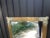 Period French Art Nouveau Brass Beveled Mirror. Stunning antique French Art Nouveau brass hand hammered beveled mirror...
