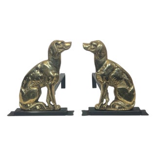 Pair of chiseled bronze andirons representing dogs For Sale