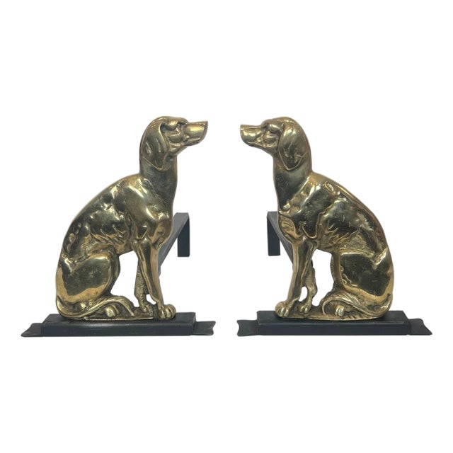 Pair of chiseled bronze andirons representing dogs For Sale