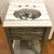 Original Retail $3900, stylish Ambella Home Modern Gray Wood and Marble Spindle Sink/Vanity, white and gray marble top...