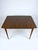 Vintage Mid-Century Modern wood and Formica dining table featuring tapered legs with metal tips. H: 30.5 inches W: 47...