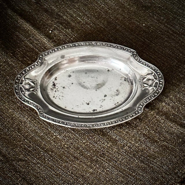 "An antique silver-plated commercial serving platter custom-made by Reed & Barton for the historic Hotel Deshler in...