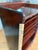 Mahogany wood sheet music cabinet featuring an open front with multiple stepped interior shelves and a lower compartment,...
