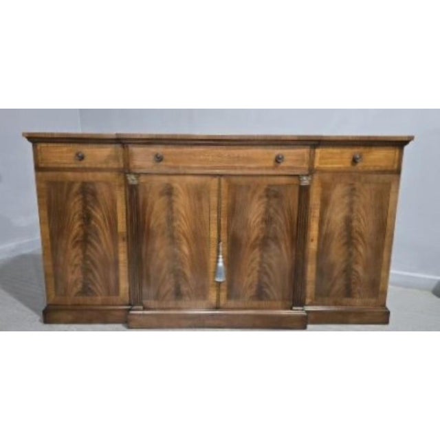 Excellent quality Regency style mahogany four door breakfront sideboard with brass inlay, three drawers with brass...