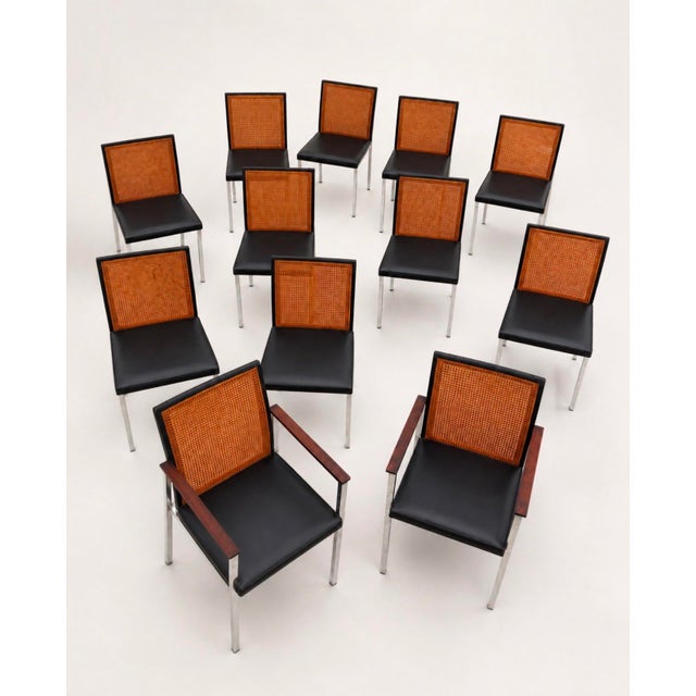 An exceptionally rare set of twelve mid-century dining chairs designed by Paul McCobb for Lane Furniture. The set includes...