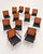 An exceptionally rare set of twelve mid-century dining chairs designed by Paul McCobb for Lane Furniture. The set includes...