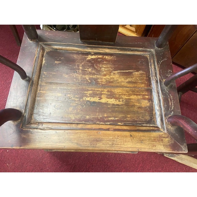 This pair of Oriental wooden arm chairs were found locally. I do not know the wood type sorry, possibly Elm. Overall solid...