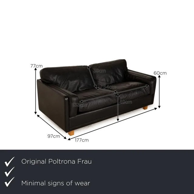 The Socrates sofa from Poltrona woman is covered with a black real leather and stands on wooden feet. The classic design...