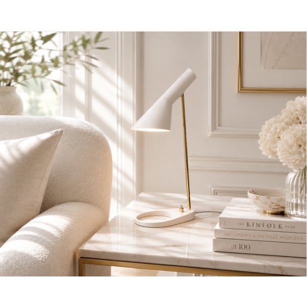 Celebrate one of the most iconic designs in Scandinavian modernism with this rare AJ Mini Anniversary Edition Table Lamp,...