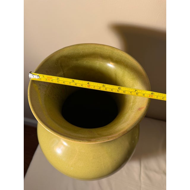 Add a stunning splash of color to your interior with this substantial ceramic temple vase by luxury decor brand Emissary...