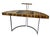 Semi-circular desk with black lacquered metal legs, a white ebony veneer top, and a black leather writing surface. The...