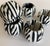 Set of 6 leather napkin rings in a classic and fun stripe pattern. Use them as part of a coastal, nautical table setting...