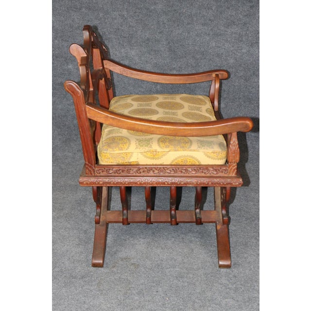 This magnificent vintage Italian Savonarola chair, attributed to Cimolotti design and dating to the 1960s, is an...