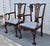 Antique (1910's) Pair of Dining Chairs have a Chippendale Style. The Frames are Wood. Mahogany with a Ball & Claw Foot and...