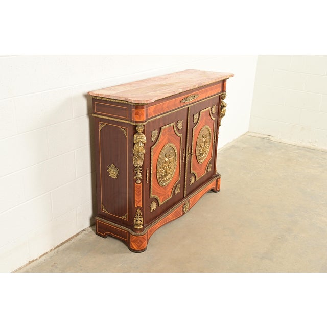 An outstanding French Napoleon III or Neoclassical style buffet server, bar cabinet, or commode In the manner of Paul...