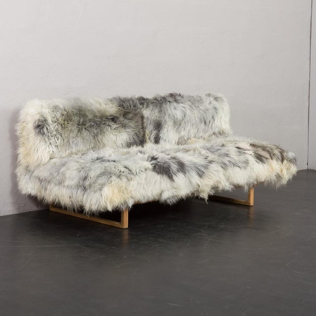 The børge mogensen oak daybed for fredericia stolefabrik, crafted in denmark during the 1960s, is a design masterpiece...