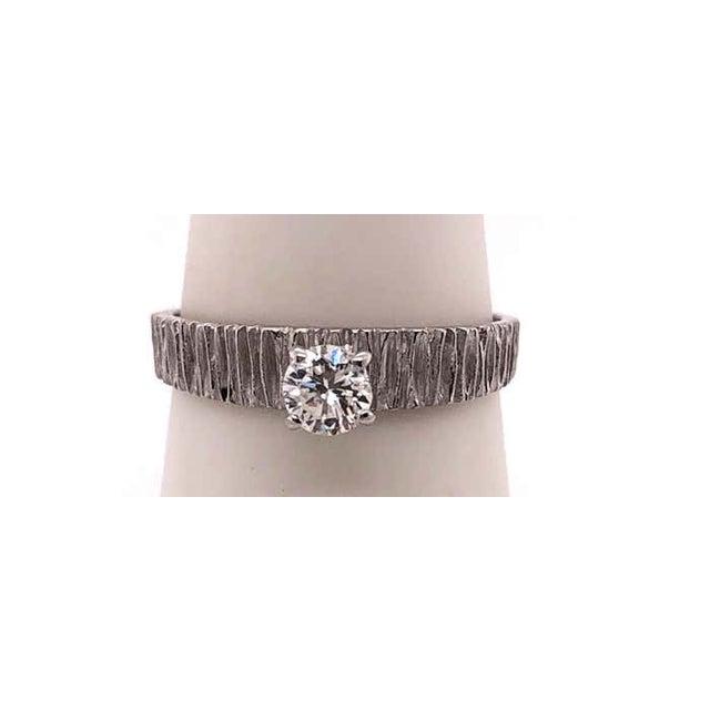 14Kt White Gold Engagement Ring 0.50 Total Diamond Weight. Size 6.75 with 2.24 grams total weight.