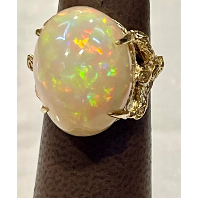 10 Carat Oval Shape Ethiopian Opal Cocktail Ring 14 Karat Yellow Gold For Sale - Image 9 of 18