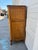 We have a beautiful French Provincial style tall chest for sale. This elegant vintage dresser features a classic Louis XV...
