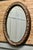 Large Oval Gesso Mirror Decorated with Fruit This Mirror has an 3.5” wide oval frame, this is intricately carved and...