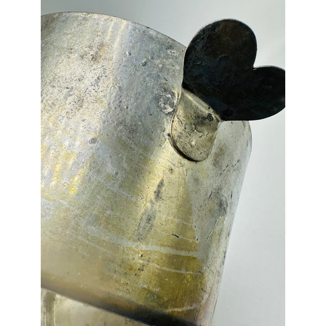 This is a small antique French metal lidded pot, sometimes called a pâté pot or terrine. It’s made of a silvery alloy...