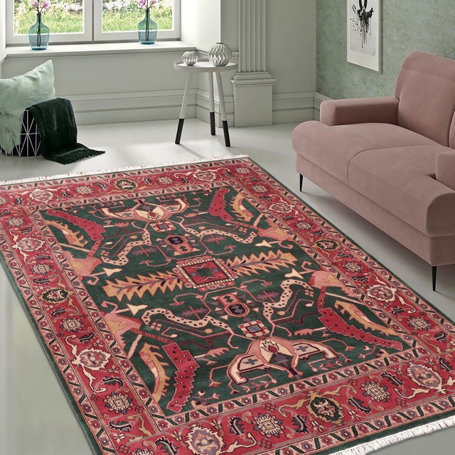 Bring depth, character, and artisan craftsmanship into your home with this hand‑knotted wool area rug, featuring a...
