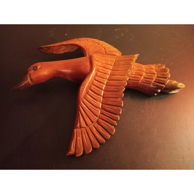 It is a Handcarved Wooden 9" Duck Or Seagull Sculpture Wall Decor Procured at auction