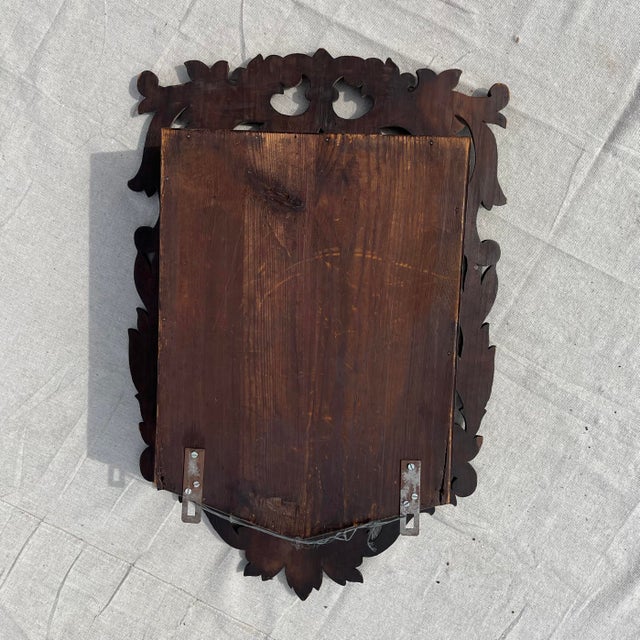 Beautiful, antique Swiss Black Forest wall cabinet acquired from a private European collection. This item is in excellent...