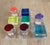 A playful 1980s tic-tac-toe set rendered in substantial clear and brilliantly colored Lucite. The transparent game board...