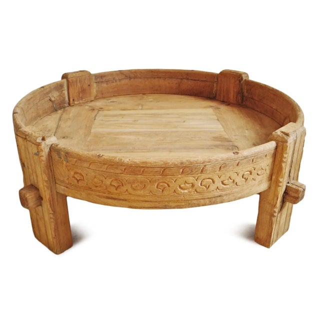 Vintage hand carved bleached wood grinder stool table from India. Great used as a low side table or with a cushion for...