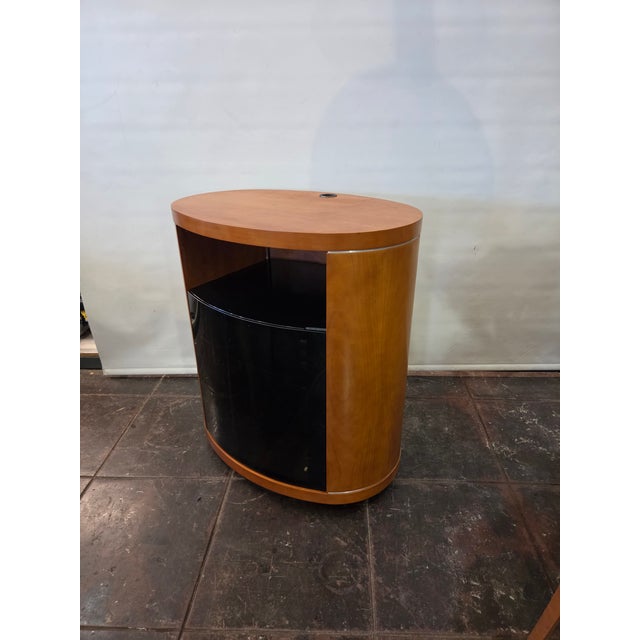 Cherry wood Danish Modern Design stereo /Tv/ Turntable stand. Comes with adjustable shelves two glass and a unique design....
