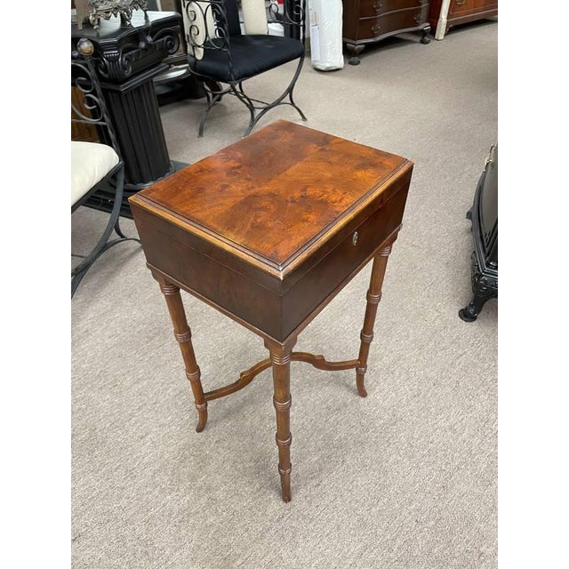 Vintage Lift Top style side table made of solid walnut with a burl wood top. The Underside is marked to have been made by...