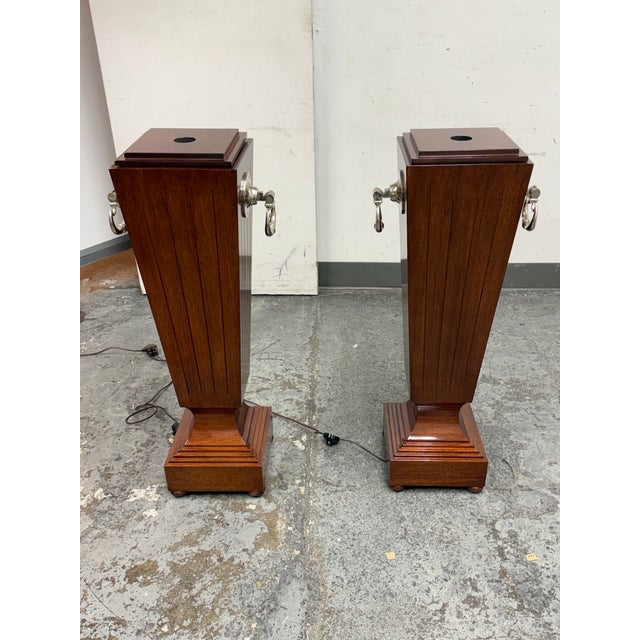 Design Plus Gallery presents a Pair of Regency Style Lighted Mahogany Display Pedestals. This pair has tapered mahogany...
