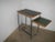 The side table is retractable. The structure is made of bent iron tube. This piece has an attribution mark, I am sure that...