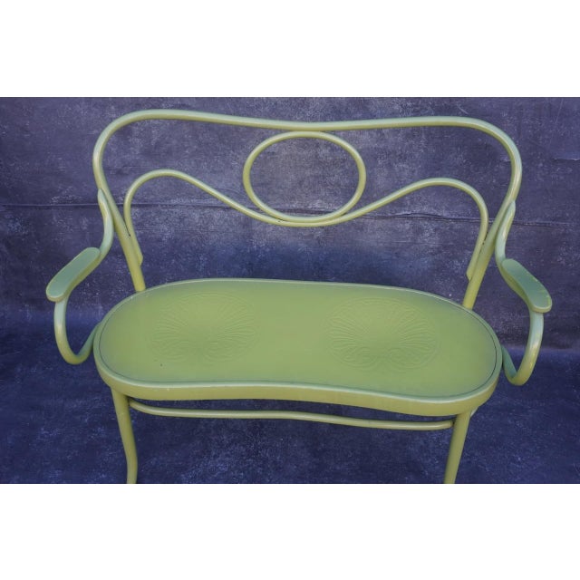 This 1904 Thonet bench has been thoughtfully refurbished with a bold pop-art touch. Professionally restored and painted in...