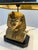 Striking vintage Egyptian Revival table lamp featuring a sculptural pharaoh bust base in a warm brass-toned finish, paired...