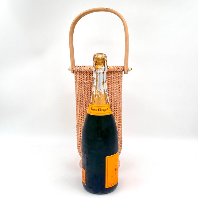 Perfect for the Coastal Chic, Nantucket, Preppy Decor aficionado. This vintage Nantucket basket serves as a wine bucket,...